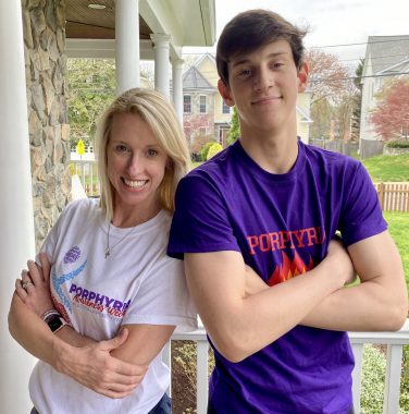 Porphyria News | Columnist Kristen Wheeden poses with her son, Brady, who is much taller. Brady is wearing a purple porphyria shirt and Kristen is wearing a white one with purple writing. Both have their arms crossed and are smiling