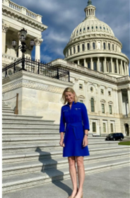 healthcare policy issues | Porphyria News | Kristen Wheeden stands in front of the U.S. Capitol, ready to discuss policy issues with legislators.