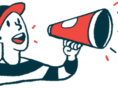 A person wearing a baseball cap speaks through a megaphone.