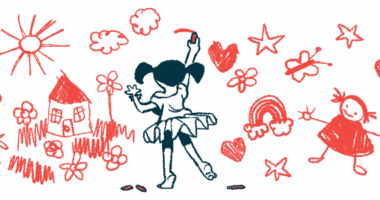 A girl is seen from behind, drawing with chalk.