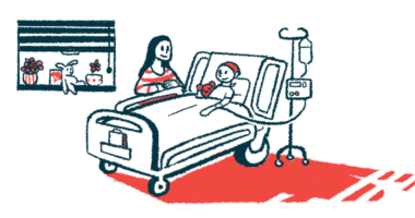 A parent stands next to the hospital bed of a child receiving an intravenous infusion into the arm.
